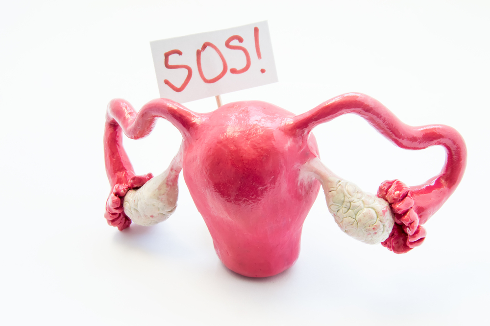 Illustration - uterus with an SOS sign